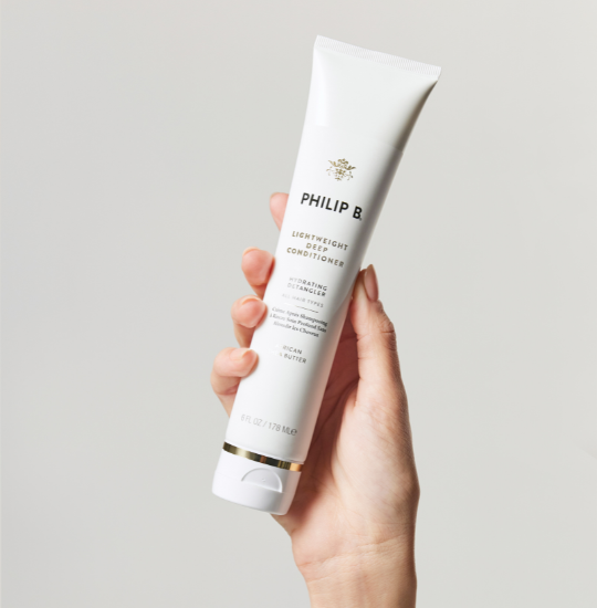 hand-holding-philip-b-lightweight-deep-conditioner