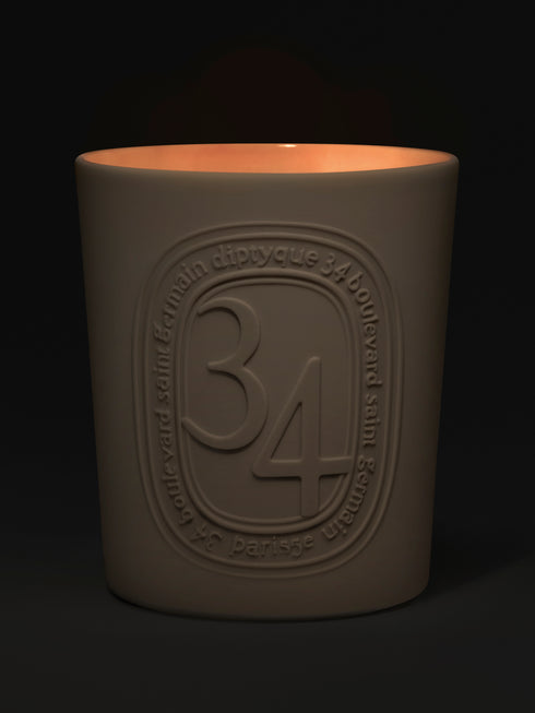 diptyque-34-scented-candle-600g-in-dark-background