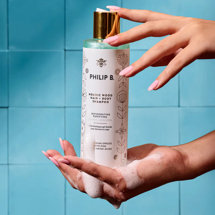 hand-holding-philip-b-nordic-wood-hair-body-shampoo