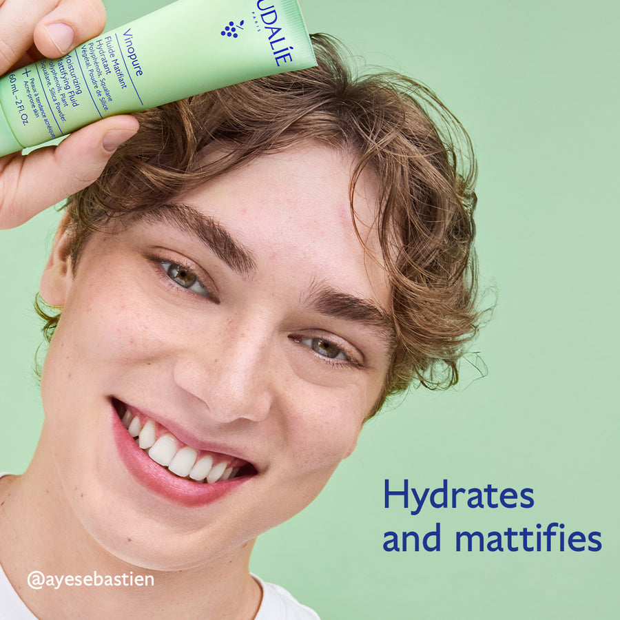 person-holding-vinopure-lotion