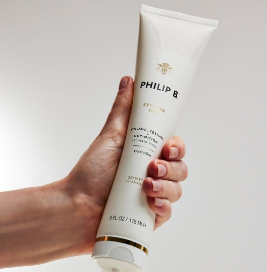 hand-holding-philip-b-volume-texture